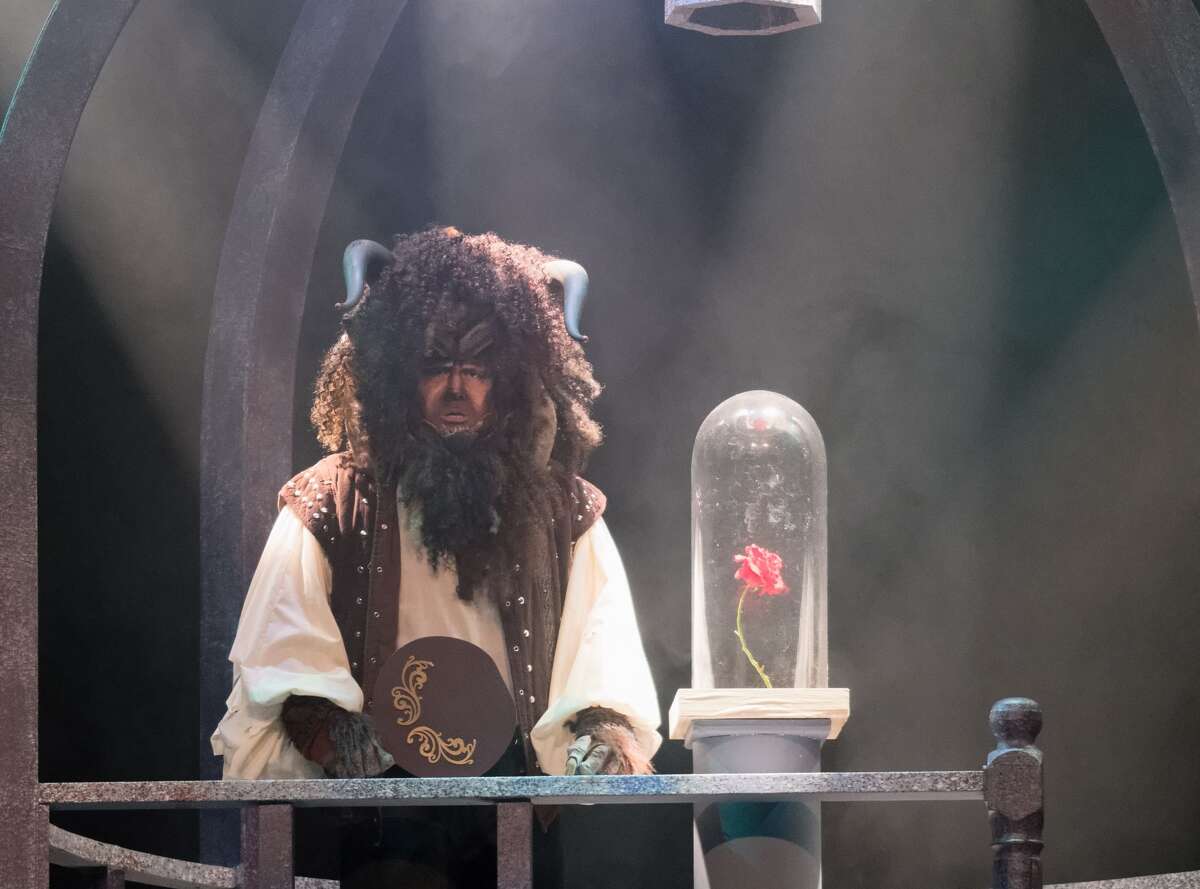 STEVEN SIMPKINS | for the Daily News True Rogers rehearses a scene from the Center Stage Theatre's production of "Beauty and the Beast" Wednesday evening at the Midland Center for the Arts. The musical opens March 25 at 7:30 p.m. and has five more shows running March 26 at 3 p.m., March 30-April 1 at 7:30 p.m., April 2 at 3:00 p.m.