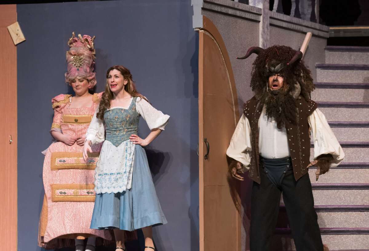 STEVEN SIMPKINS | for the Daily News From left: Meagan Eager, Tara Besso Ell and True Rogers rehearse a scene from the Center Stage Theatre's production of "Beauty and the Beast" Wednesday evening at the Midland Center for the Arts. The musical opens March 25 at 7:30 p.m. and has five more shows running March 26 at 3 p.m., March 30-April 1 at 7:30 p.m., April 2 at 3:00 p.m.