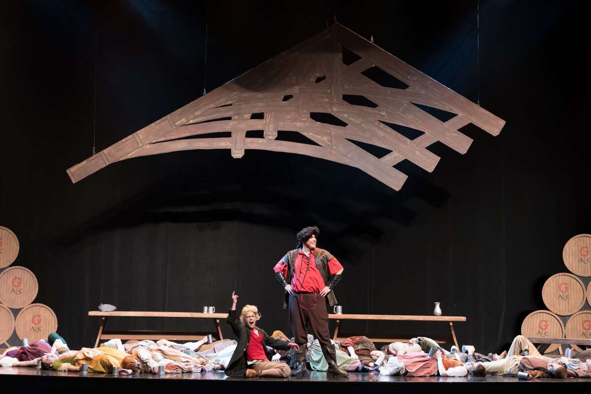 STEVEN SIMPKINS | for the Daily News Phillip James Horen, left, and Patrick Schefsky rehearse a scene from the Center Stage Theatre's production of "Beauty and the Beast" Wednesday evening at the Midland Center for the Arts. The musical opens March 25 at 7:30 p.m. and has five more shows running March 26 at 3 p.m., March 30-April 1 at 7:30 p.m., April 2 at 3:00 p.m.
