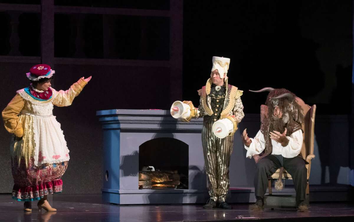 STEVEN SIMPKINS|for the Daily News From left: Sarah Smith, Stephen Fort and True Rogers rehearse a scene from the Center Stage Theatre's production of "Beauty and the Beast" Wednesday evening at the Midland Center for the Arts. The musical opens March 25 at 7:30 p.m. and has five more shows running March 26 at 3 p.m., March 30-April 1 at 7:30 p.m., April 2 at 3:00 p.m.