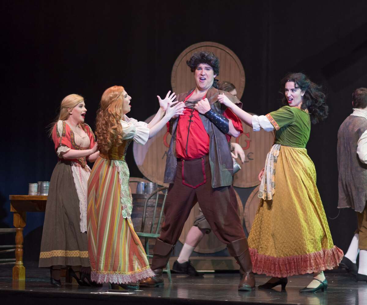 STEVEN SIMPKINS | for the Daily News From left: Brittany Ann Nicol, Mackenzie Hopkins, Jaeleen Davis and Patrick Schefsky rehearse a scene from the Center Stage Theatre's production of "Beauty and the Beast" Wednesday evening at the Midland Center for the Arts. The musical opens March 25 at 7:30 p.m. and has five more shows running March 26 at 3 p.m., March 30-April 1 at 7:30 p.m., April 2 at 3:00 p.m.