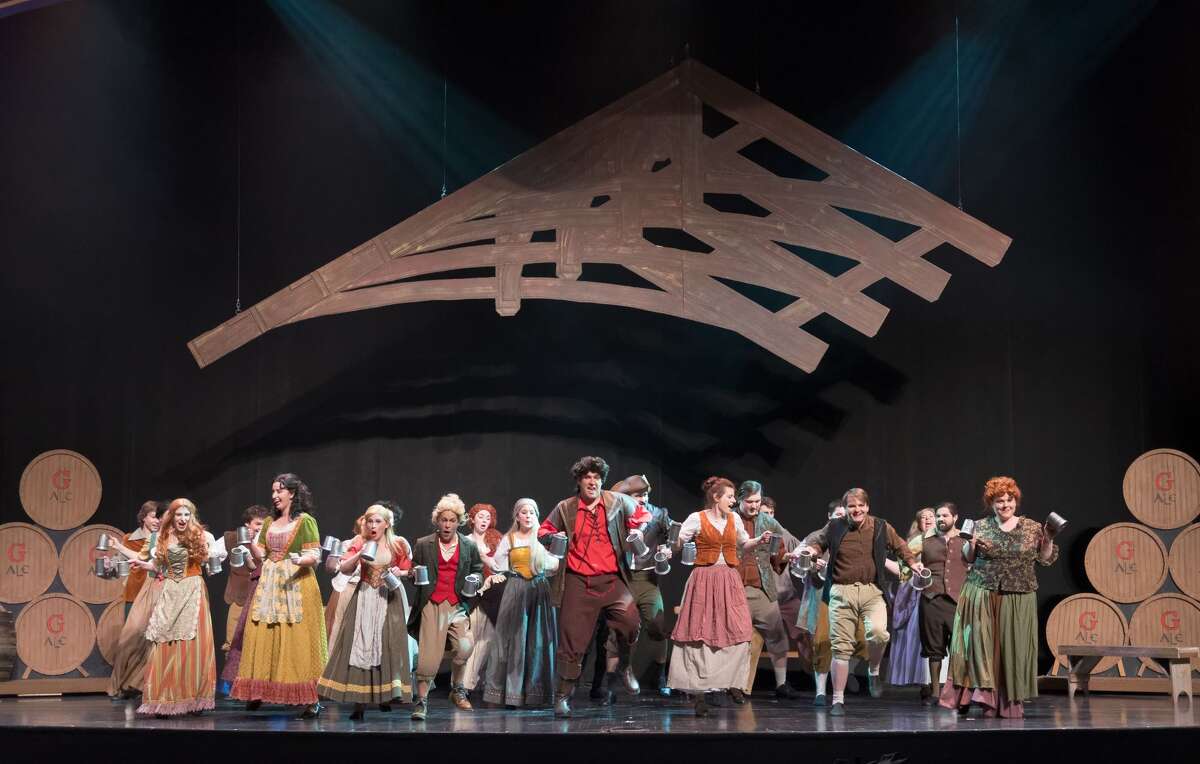 STEVEN SIMPKINS | for the Daily News The cast of Center Stage Theatre's production of "Beauty and the Beast" rehearse a scene at the Midland Center for the Arts Wednesday evening. The musical opens March 25 at 7:30 p.m. and has five more shows running March 26 at 3 p.m., March 30-April 1 at 7:30 p.m., April 2 at 3:00 p.m.