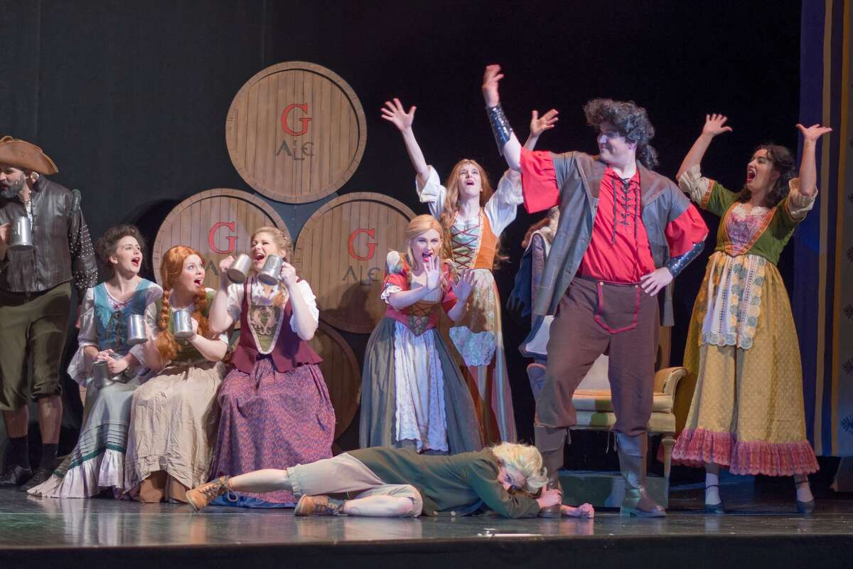STEVEN SIMPKINS | for the Daily News Patrick Schefsky, left, and Phillip James Horen rehearse a scene from the Center Stage Theatre's production of "Beauty and the Beast" Wednesday evening at the Midland Center for the Arts. The musical opens March 25 at 7:30 p.m. and has five more shows running March 26 at 3 p.m., March 30-April 1 at 7:30 p.m., April 2 at 3:00 p.m.
