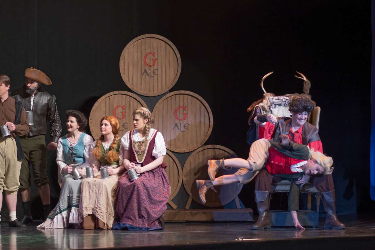 STEVEN SIMPKINS | for the Daily News Patrick Schefsky, left, and Phillip James Horen rehearse a scene from the Center Stage Theatre's production of "Beauty and the Beast" Wednesday evening at the Midland Center for the Arts. The musical opens March 25 at 7:30 p.m. and has five more shows running March 26 at 3 p.m., March 30-April 1 at 7:30 p.m., April 2 at 3:00 p.m.