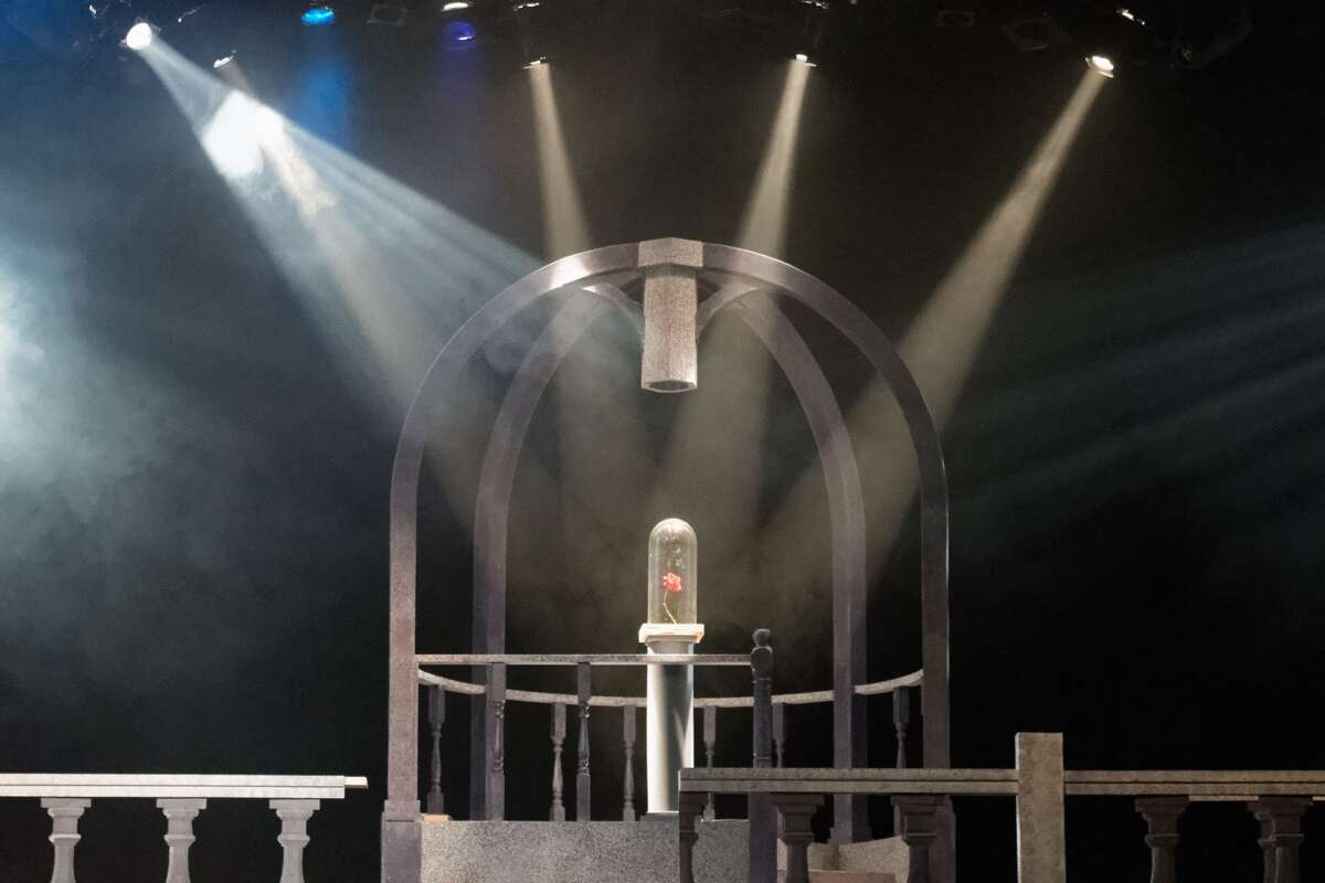 STEVEN SIMPKINS | for the Daily News The rose from the Center Stage Theatre's production of "Beauty and the Beast" is illuminated on stage during a Wednesday rehearsal at the Midland Center for the Arts. The musical opens March 25 at 7:30 p.m. and has five more shows running March 26 at 3 p.m., March 30-April 1 at 7:30 p.m., April 2 at 3:00 p.m.
