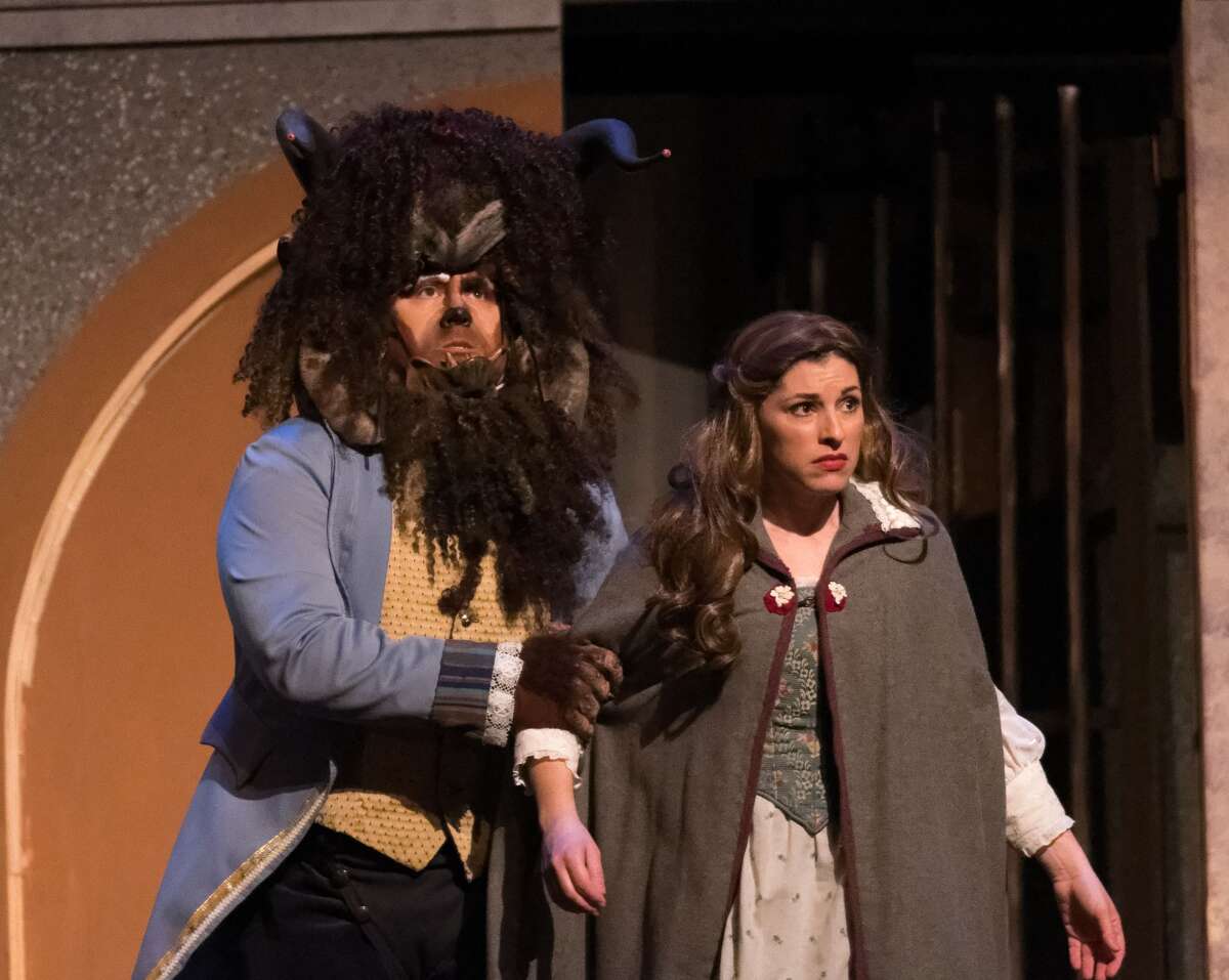 STEVEN SIMPKINS | for the Daily News True Rogers, left, and Tara Besso Ell rehearse a scene from the Center Stage Theatre's production of "Beauty and the Beast" Wednesday evening at the Midland Center for the Arts. The musical opens March 25 at 7:30 p.m. and has five more shows running March 26 at 3 p.m., March 30-April 1 at 7:30 p.m., April 2 at 3:00 p.m.