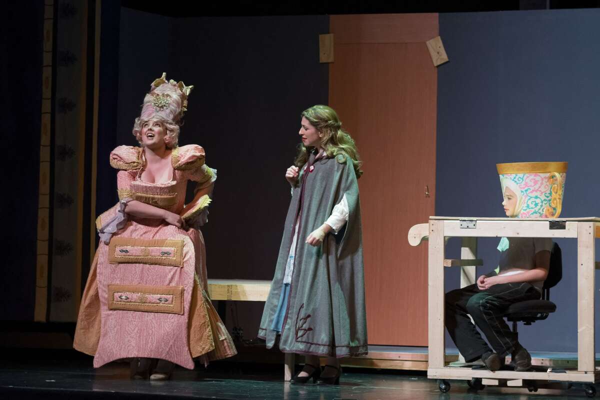 STEVEN SIMPKINS | for the Daily News From left: Meagan Eager, Tara Besso Ell and Easton Damude rehearse a scene from the Center Stage Theatre's production of "Beauty and the Beast" Wednesday evening at the Midland Center for the Arts. The musical opens March 25 at 7:30 p.m. and has five more shows running March 26 at 3 p.m., March 30-April 1 at 7:30 p.m., April 2 at 3:00 p.m.