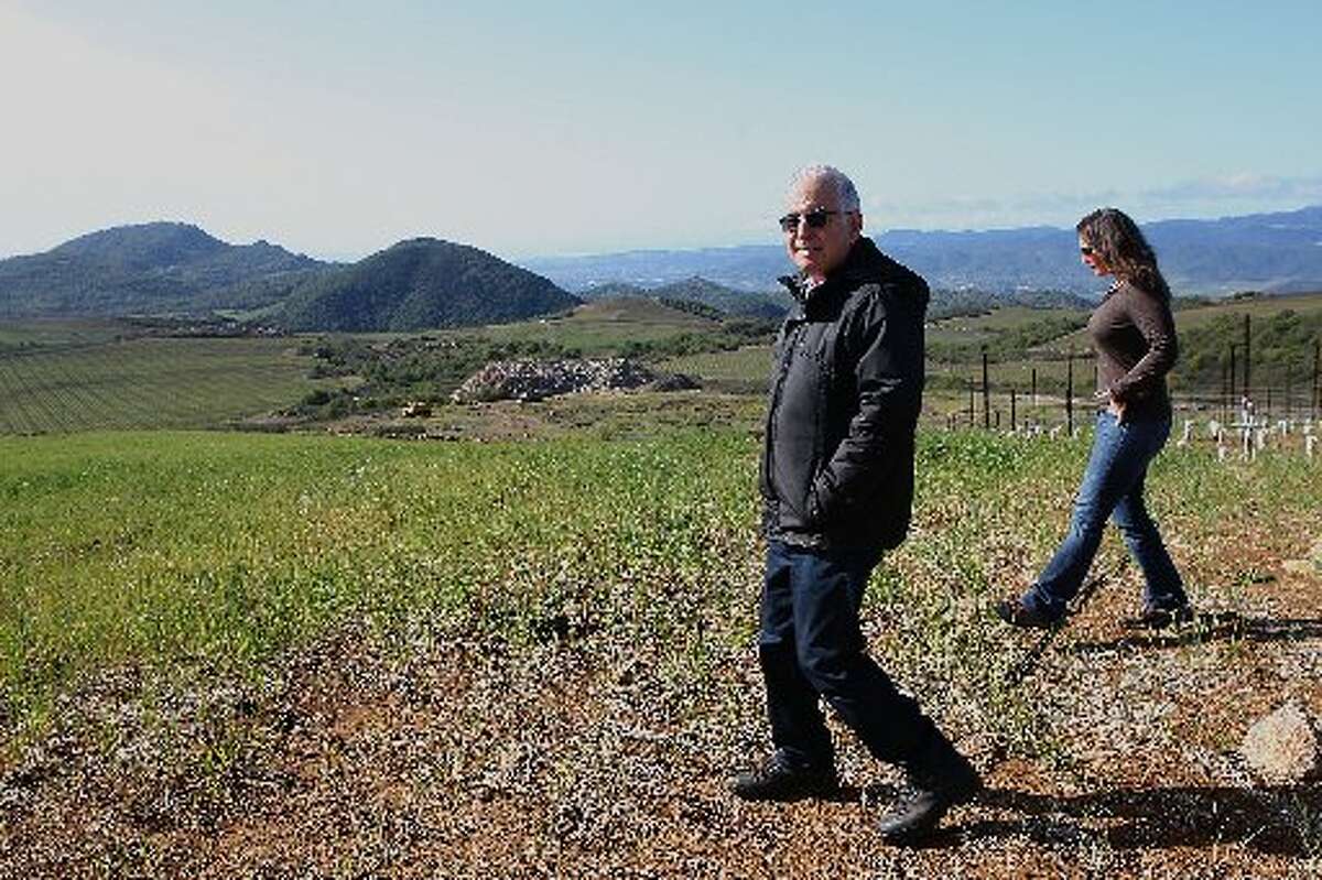 Founder Dr. Jan Krupp and former viticulturist Amy Warnock (Gabrielle Shaffer is the current viticulturist), showing where they will be planting more vines at Stagecoach Vineyard in 2012.
