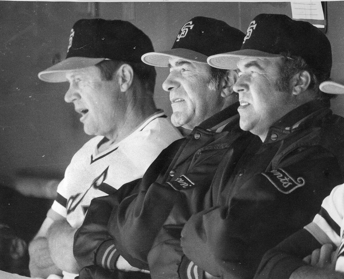 Giants manager Joe Altobelli sits between coaches Bobby Winkles and Herm Starrette on Opening Day in 1977. It was Altobelli’s first game as a major-league manager.