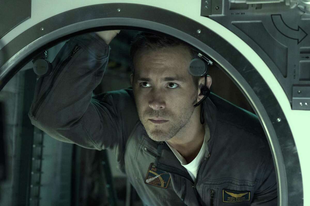 Something on the other side of the glass is thinking Ryan Reynolds might make a good snack.
