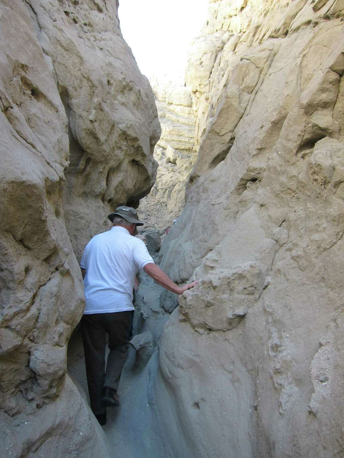 Hike slot canyons as part of a Red Jeep tour or on your own in the Coachella Valley.