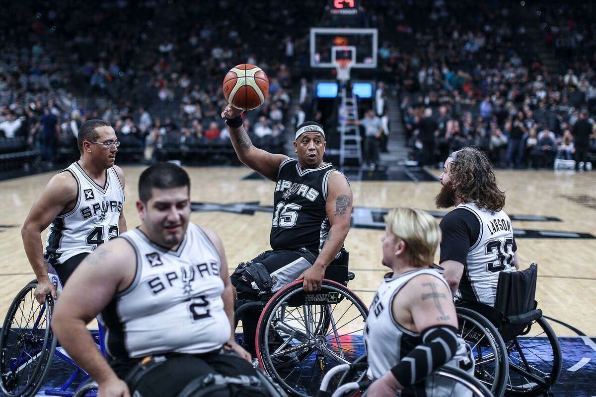 Members of the Spurs-sponsored wheelchair basketball team compete during a 2017 game at the AT&T Center.