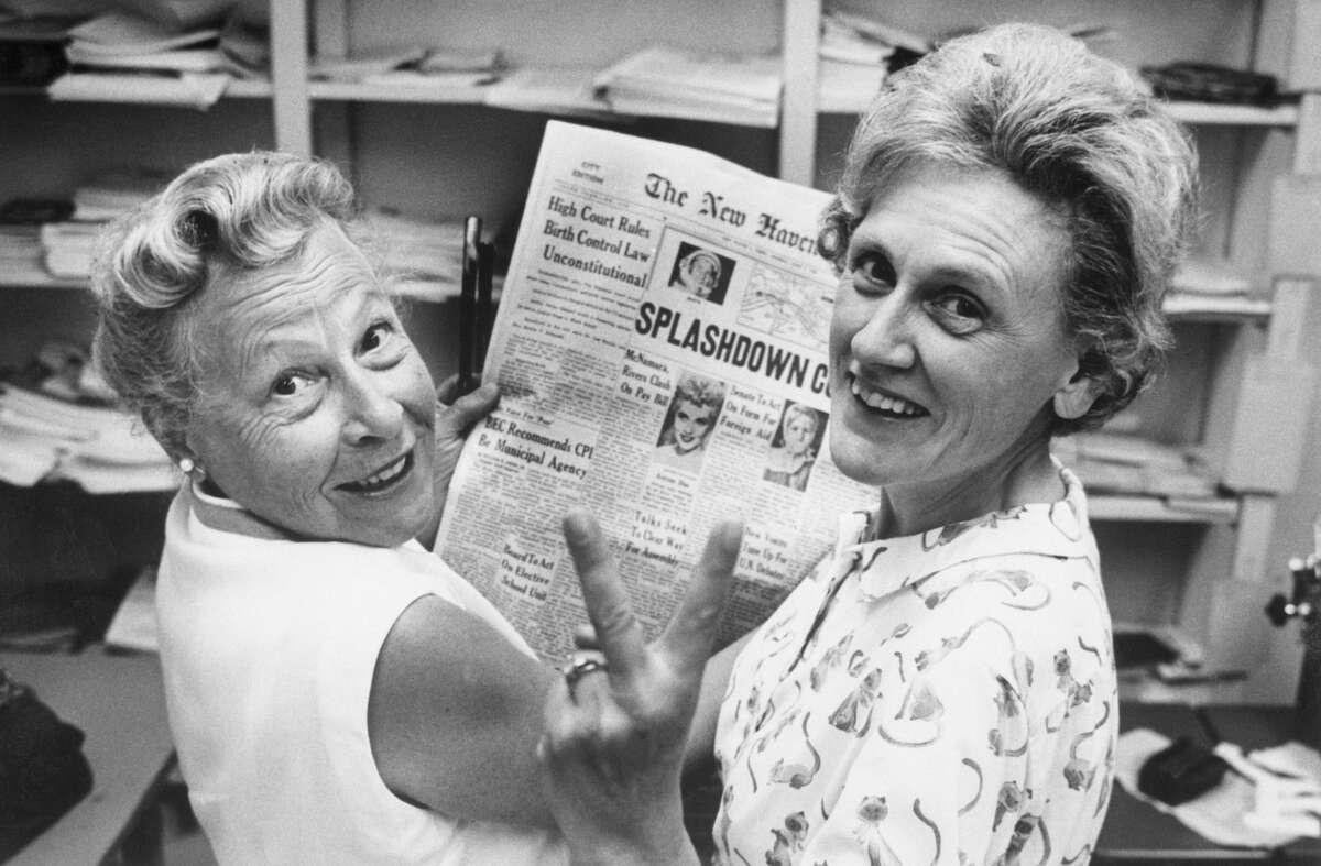 Mrs. Estelle Griswold (L), medical advisor and Executive director of the Planned Parenthood Clinic in New Haven, and Mrs. Ernest Jahncke, President of Parenthood League of Connecticut, INC., flash a victory sign as a result of the court's decision that the birth control law is unconstitutional.