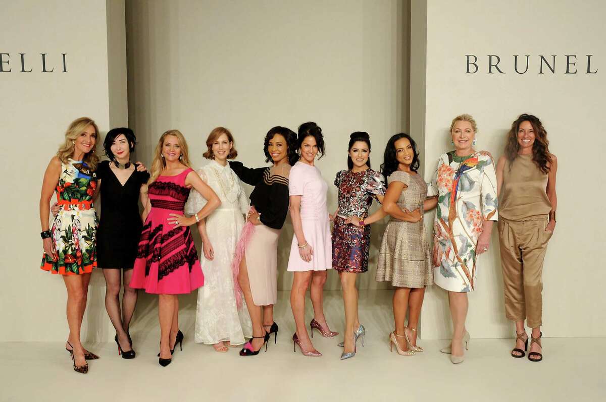 Honorees Jana Arnoldy, from left, Carrie Brandsberg-Dahl, Mary D'Andrea, Carolyn Dorros, Gina Gaston Elie, Jessica Rossman, Sneha Merchant, CleRenda McGrady, Carol Linn and Lisa Holthouse at the 35th annual Houston Chronicle Best Dressed Luncheon and Neiman Marcus Fashion Show