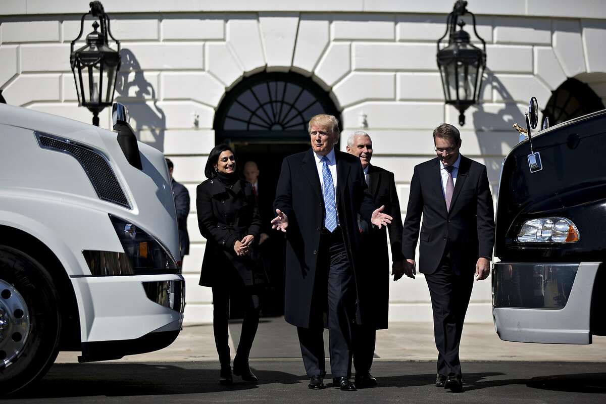 President Trump walks with Vice President Mike Pence and others last week in Washington, D.C.