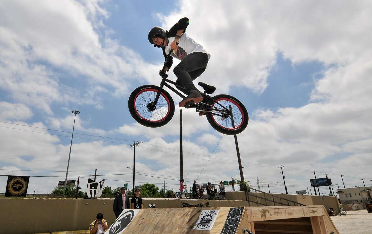 John Castillo gets some air-time on the bmx course set up at Sunday's Siclovia event along Broadway St. The event is hosted by the YMCA and the city.