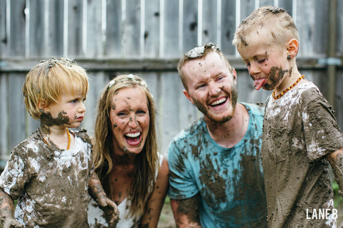 The Bartons play in the mud for an adorable maternity shoot after rain hampered their original plans.