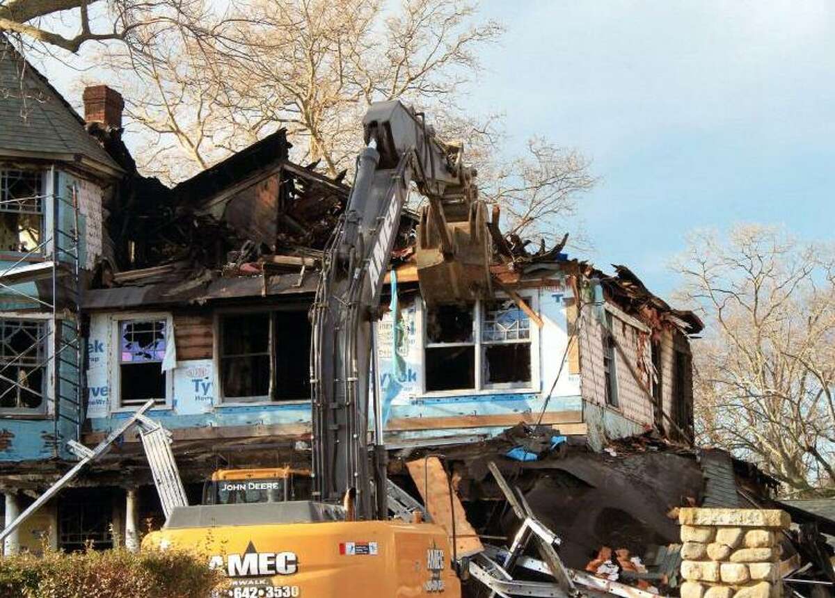 John Buzzeo, project manager of Norwalk’s AMEC Carting, testified he filled out a demolition application for Dec. 28, 2011 after his company already took down the Shippan Avenue home where five people died on Christmas Day 2011.