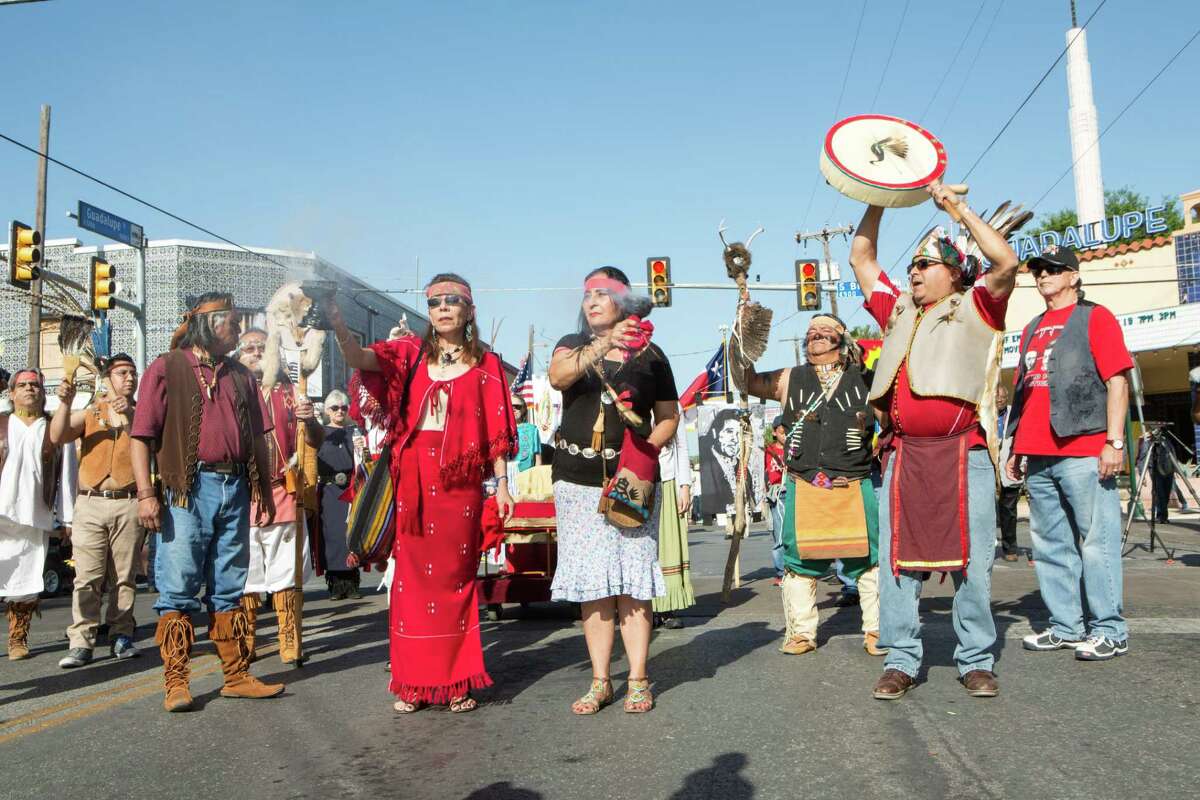 Members of the Native American Inter-Tribe group lead the Cesar Chavez march in San Antonio, Texas on March 25, 2017.