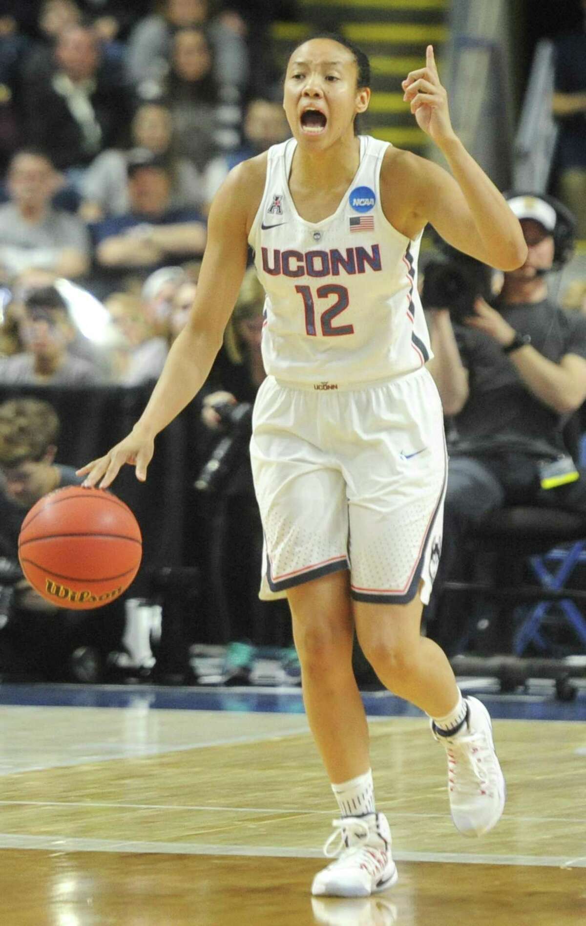 UConn's Saniya Chong takes the ball up court in No. 1 UConn's 86-71 win over No. 4 UCLA in the 2017 NCAA Division I Women's Basketball Championship Regional Semifinal game at Webster Bank Arena in Bridgeport, Conn. Saturday, March 25, 2017.