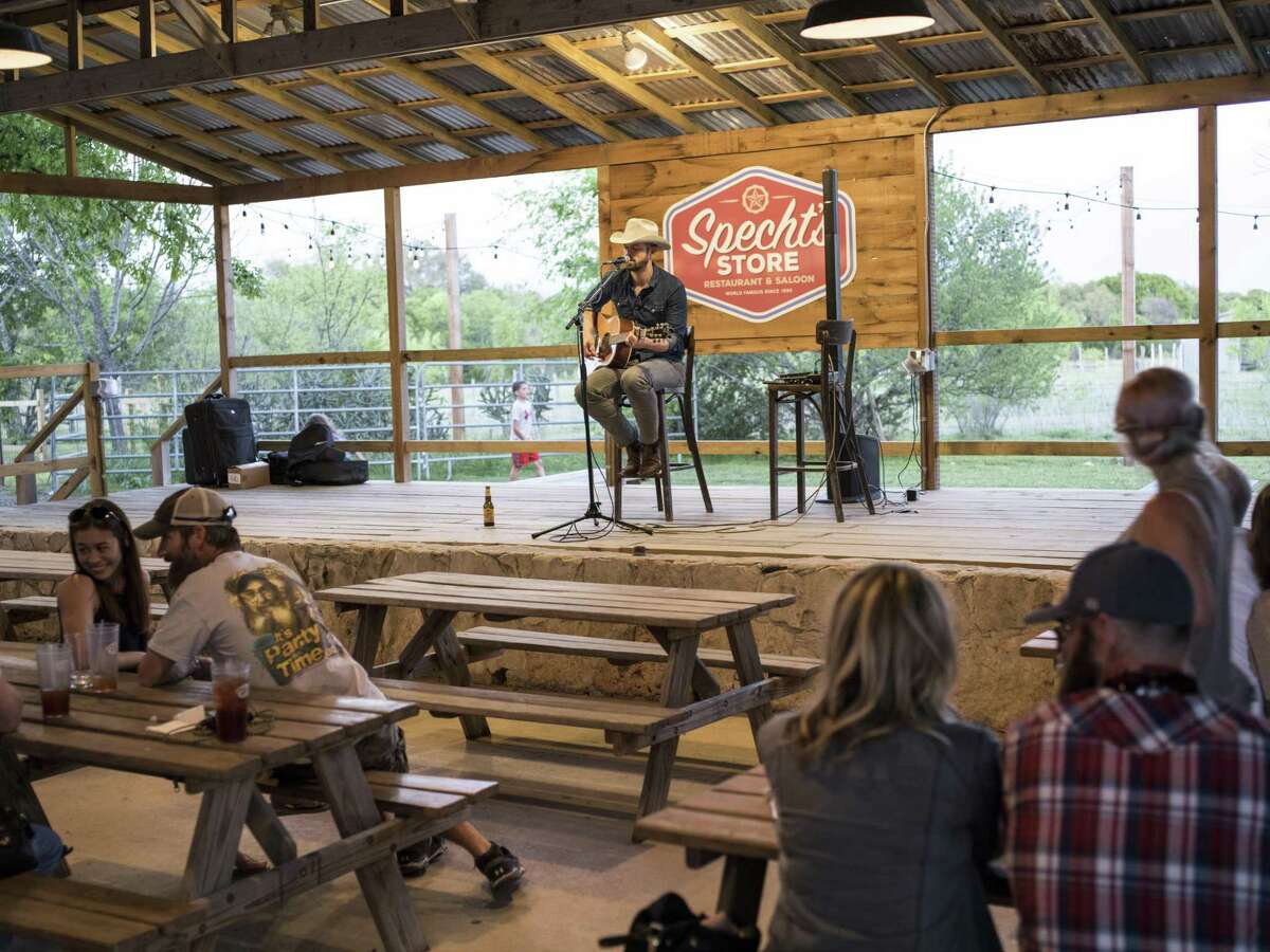 Singer Josh Grider plays a set at Specht's Store recently. Specht's reopened formally in July 2016 but they are hoping to bring in more customers this year.