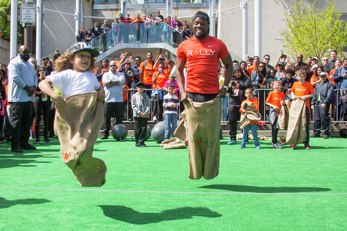 Kevin Hart participates in the sack race at Rally HealthFest in San Francisco on Saturday, March 25.