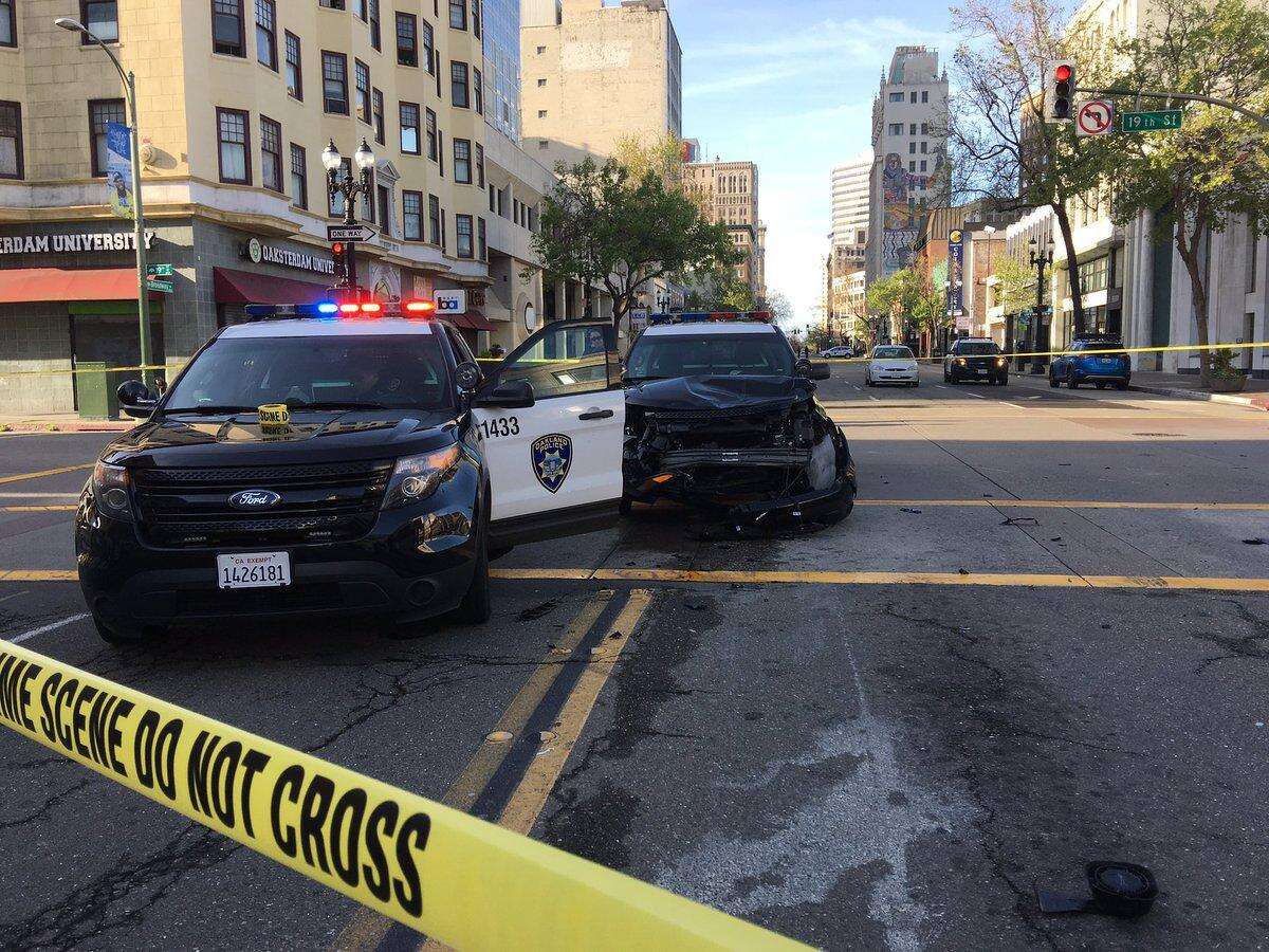 Oakland police van hits motorcycle downtown Saturday