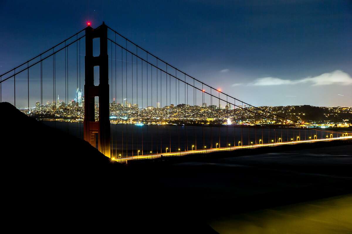 In this long exposure, the Golden Gate Bridge is seen with lights off during Earth Hour on Saturday, March 25, 2017, in the Marin Headlands, Calif. The lights were off from 8:30 p.m. to 9:30 p.m.