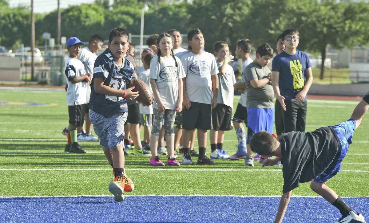 Local athletes ages 6-18 participated in the 4 th Quarter Sports Youth Football Clinic Series on Sunday at Krueger Field. The camp was led by Cowboys players Kavon Frazier, Keith Smith and Charles Tapper.