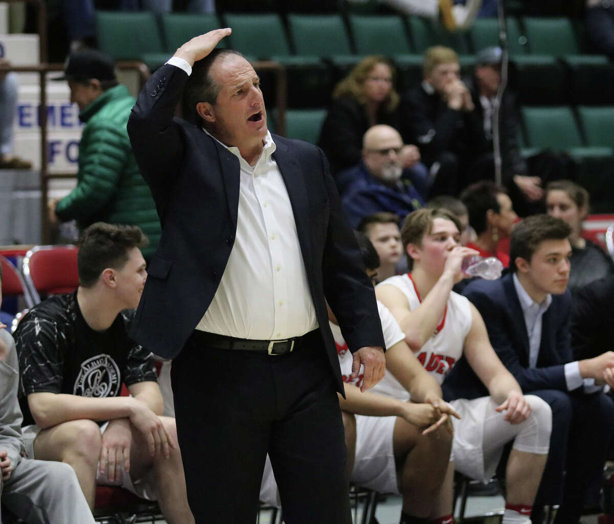 Albany Academy head coach Brian Fruscio signals his players during the Class A Federation basketball final against Walton High School at the Glens Falls Civic Center Sunday, March 26, 2017. (Ed Burke-Special to The Times Union)