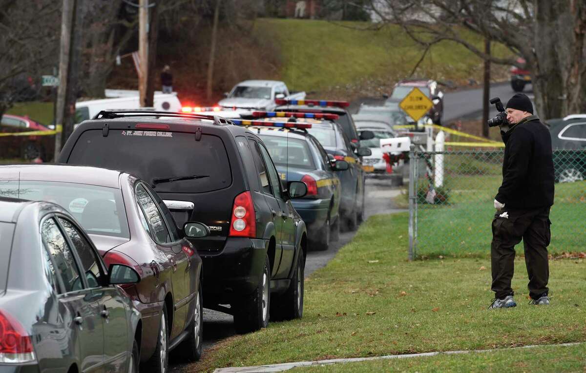 Cops Bloody sweatshirt hanging from knife in suspect's room