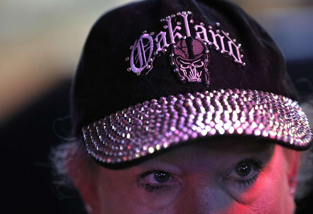 Nancy Dowell, of San Leandro, wears her Oakland Raiders hat during the announcement that the Raiders will be moving to Las Vegas at Ricky's Sports Theater and Grill in San Leandro, Calif., on Monday, March 27, 2017. The NFL announced that team owners had approved the Raiders' move to Las Vegas.