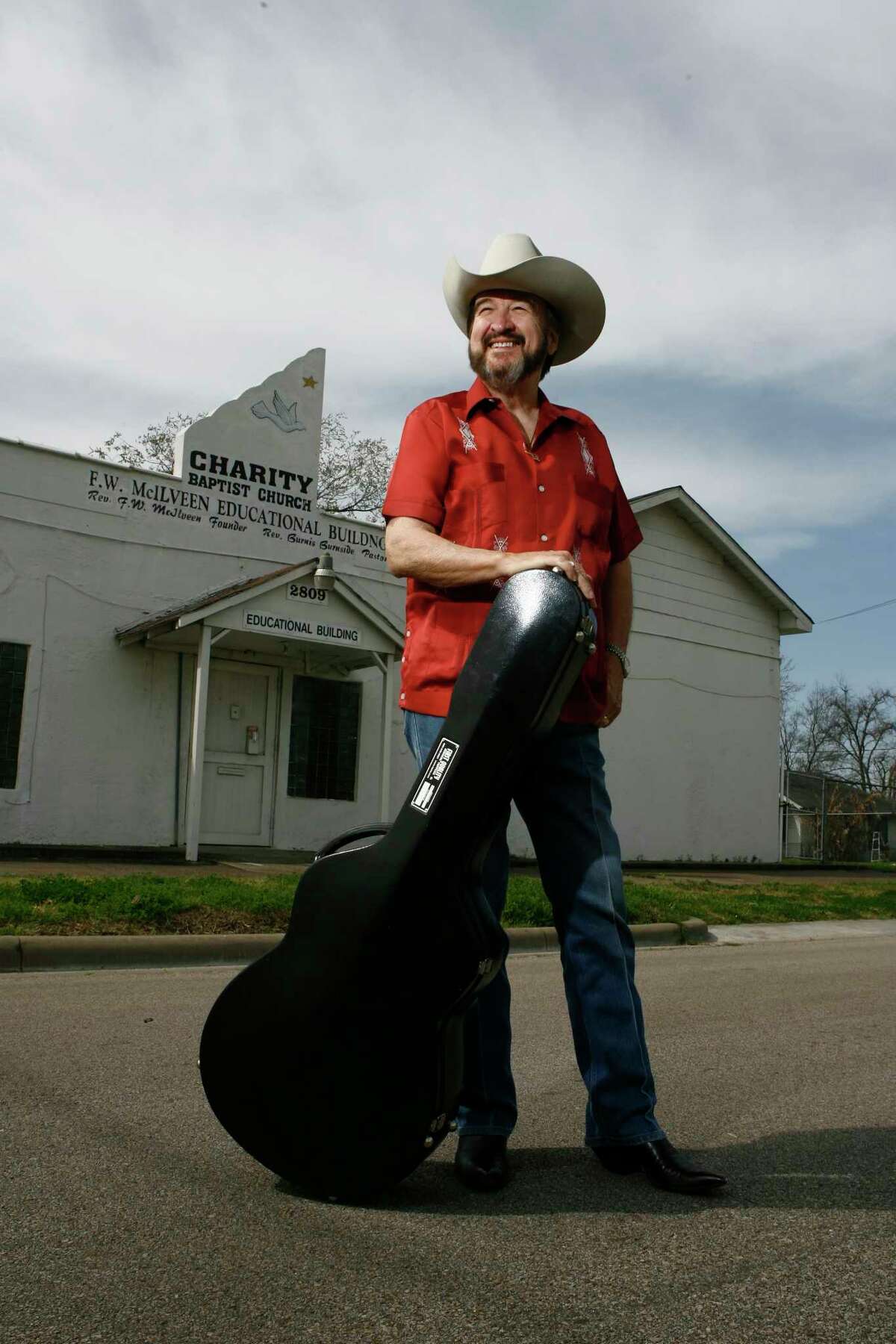 Johnny Bush stands in front of what was Peacock Studios in his old neighborhood Kashmere Gardens in Houston.