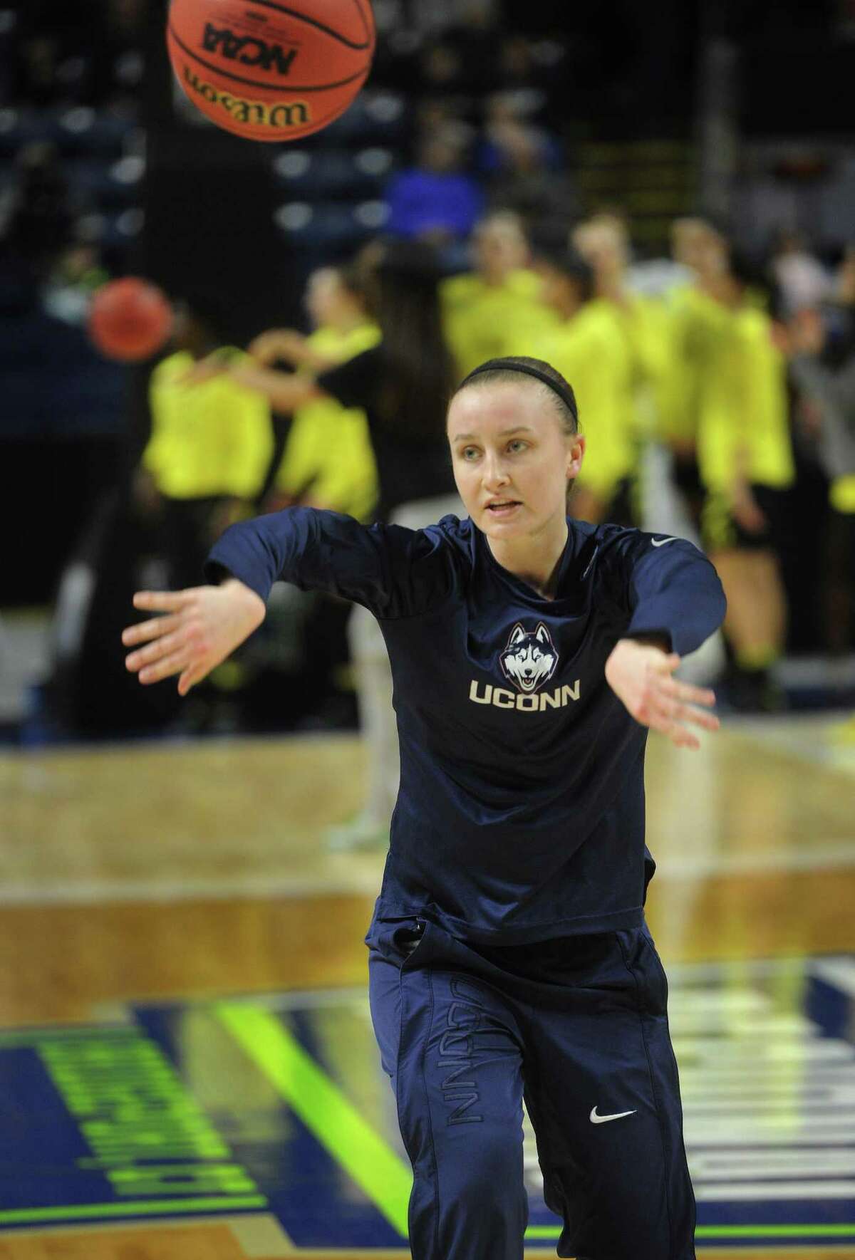 UConn’s Tierney Lawlor, of Ansonia, warms up before Monday night’s game in Bridgeport.