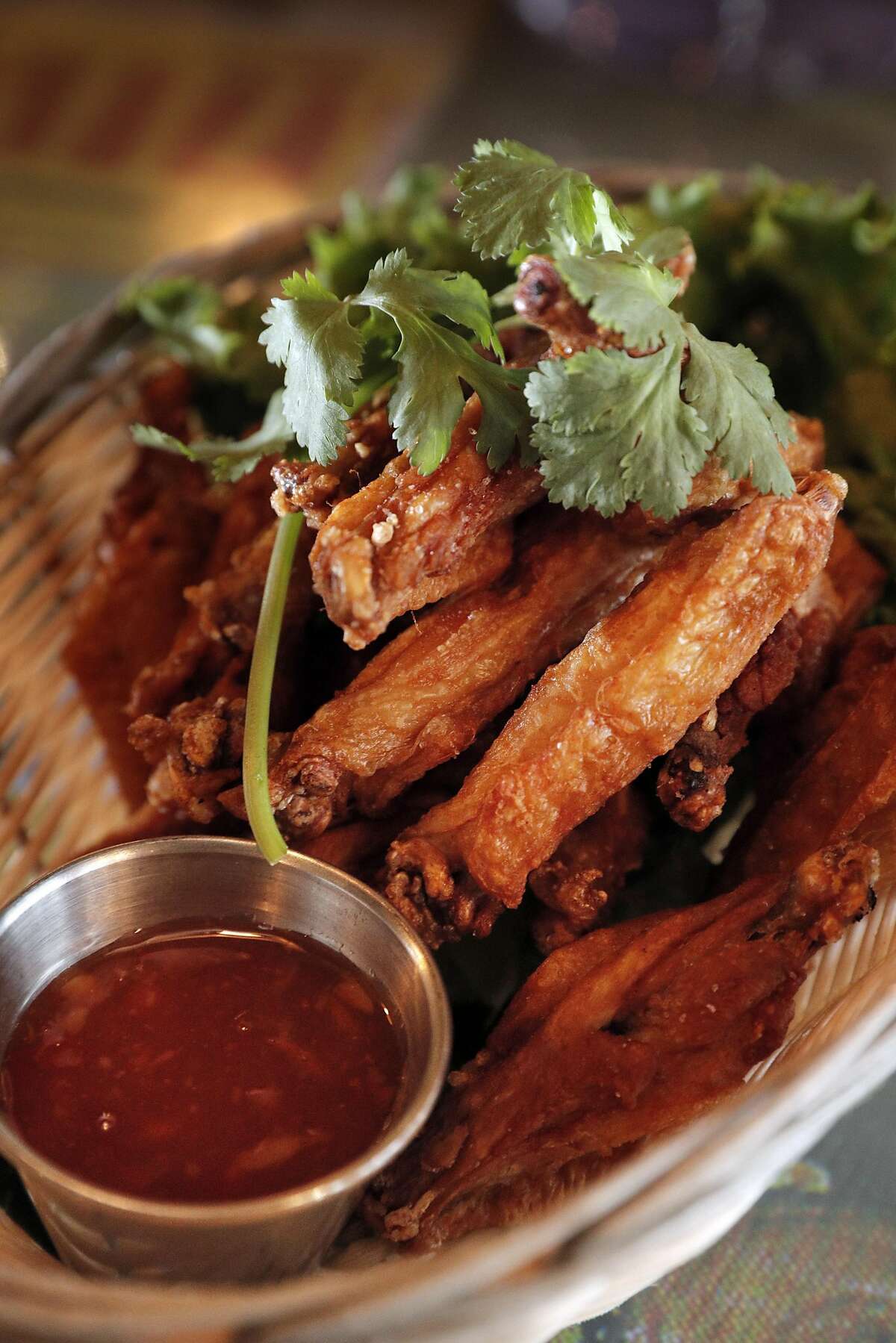 The Salted Wings served at Saap Ver, a new SOMA restaurant that specializes in lesser-known regional Thai dishes, in San Francisco, Calif., on Sunday, March 26, 2017. The restaurant has an interior, which takes inspiration from Thai countryside street markets and 1970s era outdoor film showings,