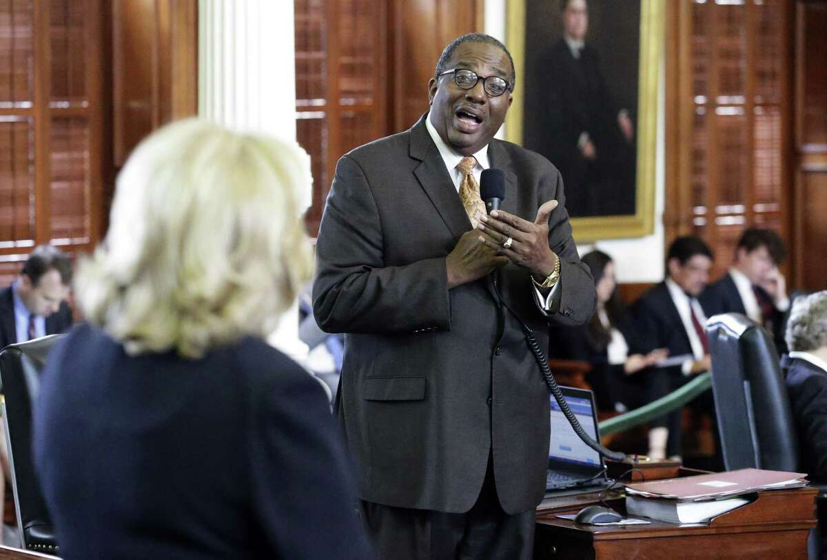 Senator Royce West expresses his reservations to Senate Finance Committee chairman Senator Jane Nelson as the Texas Senate takes up its budget proposal on the floor in the Capitol on March 28, 2017.