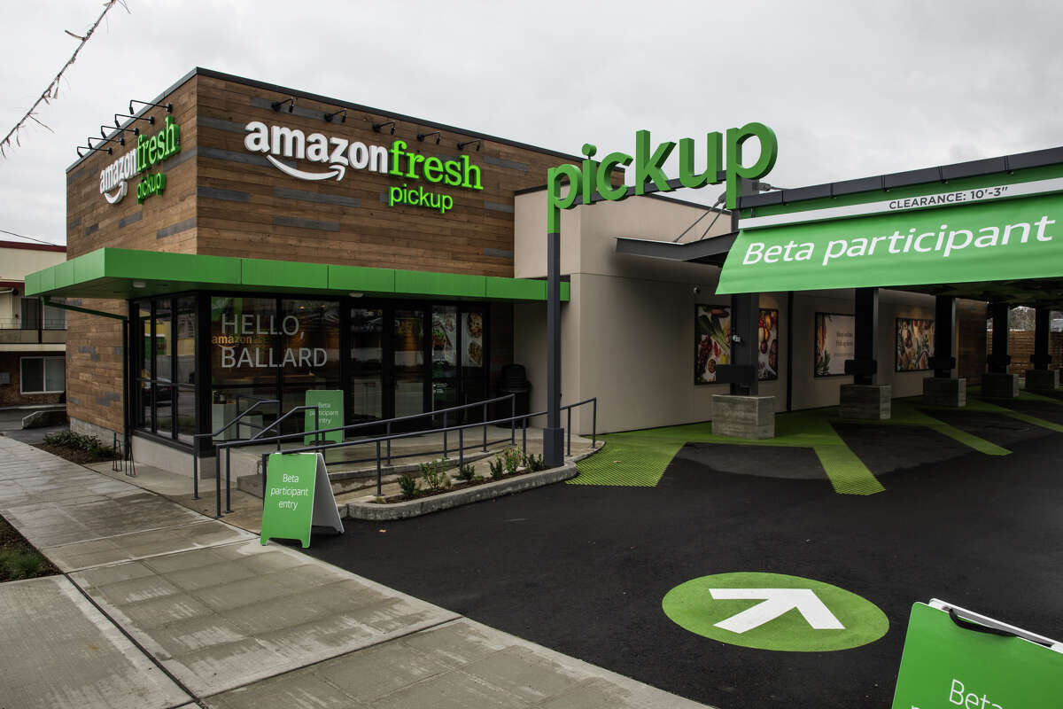 Amazon unveils new Seattle stores, grocery pickup service