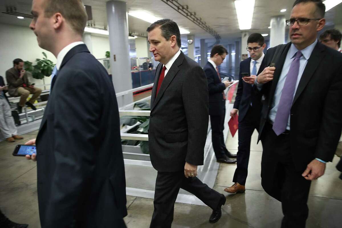 WASHINGTON, DC - FEBRUARY 27: Sen. Ted Cruz (C) (R-TX) arrives for the confirmation vote of Wilbur Ross for the position of Secretary of Commerce at the U.S. Capitol on February 27, 2017 in Washington, DC. Ross was confirmed by the Senate by a vote of 72-27. (Photo by Win McNamee/Getty Images)