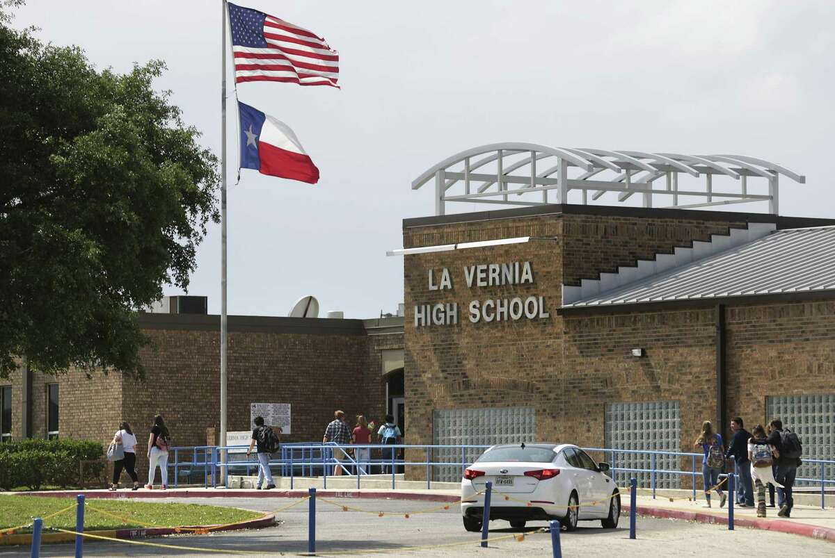 Students walk to the main building at La Vernia High School in La Vernia, TX, on Tuesday, March 28, 2017.