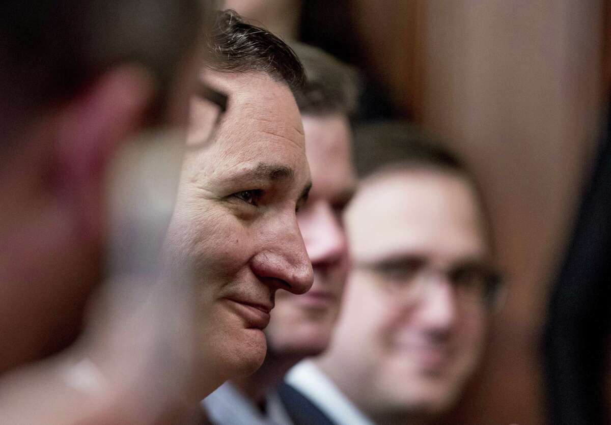 Sen. Ted Cruz, R-Texas, center, attends a swearing in ceremony for Energy Secretary Rick Perry, Thursday, March 2, 2017, in the Eisenhower Executive Office Building on the White House complex in Washington. (AP Photo/Andrew Harnik)