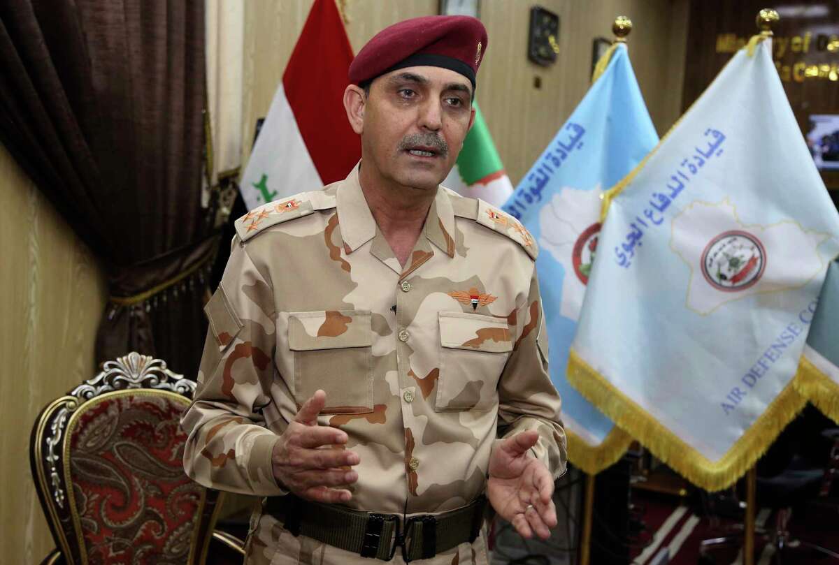 Brig. Yahya Rasool Abdullah, an Iraqi joint command spokesman, speaks during an interview with The Associated Press in Baghdad, Iraq, Tuesday, March 28, 2017. "It is a new tactic being used by the members of this terrorist group, using big car bombs against the troops that impact the civilians to inflame the public and to convey a wrong message to the world that the joint forces and the international coalition are behind the killing and bombings," he told The Associated Press. (AP Photo/Karim Kadim)