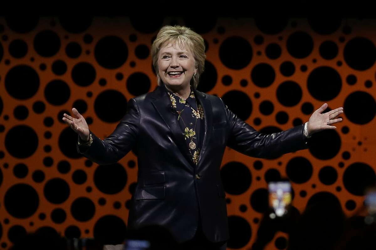 Former Secretary of State Hillary Clinton gestures while speaking before the Professional Businesswomen of California Tuesday, March 28, 2017, in San Francisco. Clinton is in San Francisco for one of her first public speeches since losing the 2016 presidential race. (AP Photo/Ben Margot)