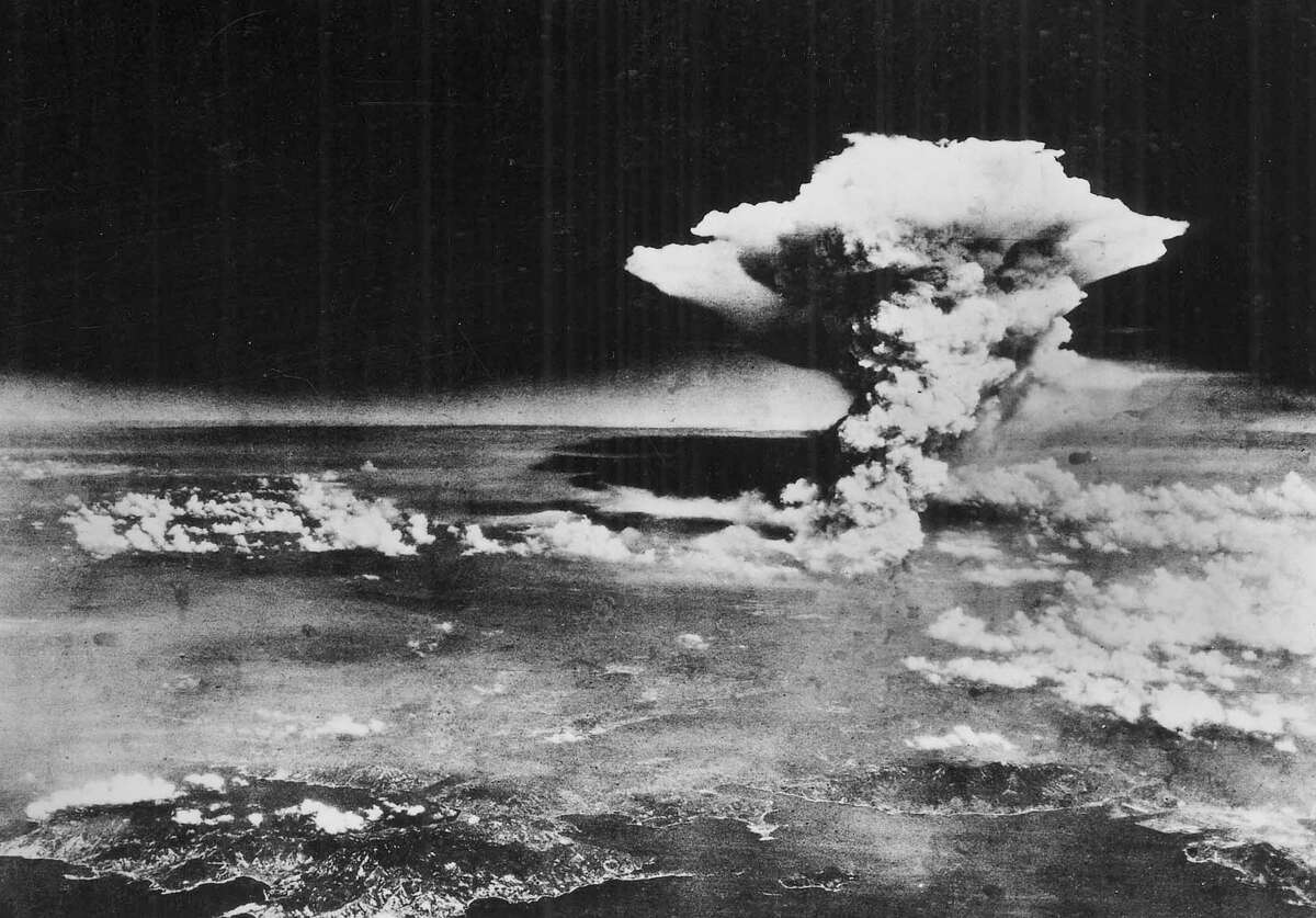 In this Monday, Aug. 6, 1945 picture made available by the U.S. Army via the Hiroshima Peace Memorial Museum, a mushroom cloud billows into the sky about one hour after an atomic bomb was detonated above Hiroshima, Japan. A movement is growing worldwide to abolish nuclear weapons, encouraged by President Barack Obama's endorsement of that goal. But "realists" argue that more stability and peace must first be achieved in the world. (AP Photo/U.S. Army via Hiroshima Peace Memorial Museum) NO SALES; MANDATORY CREDIT