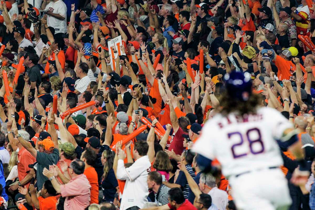 Fans cheer as Houston Astros left fielder Colby Rasmus (28) heads to first base after hitting a home run in the first inning during the Astros home opener against the Royals at Minute Maid Park Monday, April 11, 2016 in Houston. The Astros won 8-2. ( Michael Ciaglo / Houston Chronicle )