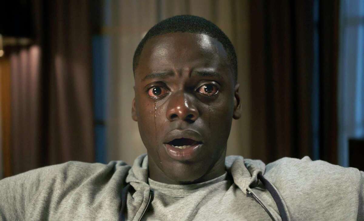 This image released by Universal Pictures shows Daniel Kaluuya in a scene from, "Get Out." Jordan PeeleÂ?’s thriller sensation Â?“Get OutÂ?” crossed $100 million over the weekend, reaching that milestone in just 16 days. ItÂ?’s a staggering result for a film that, though it cost less than $5 million to make, has become a cultural sensation. (Universal Pictures via AP)