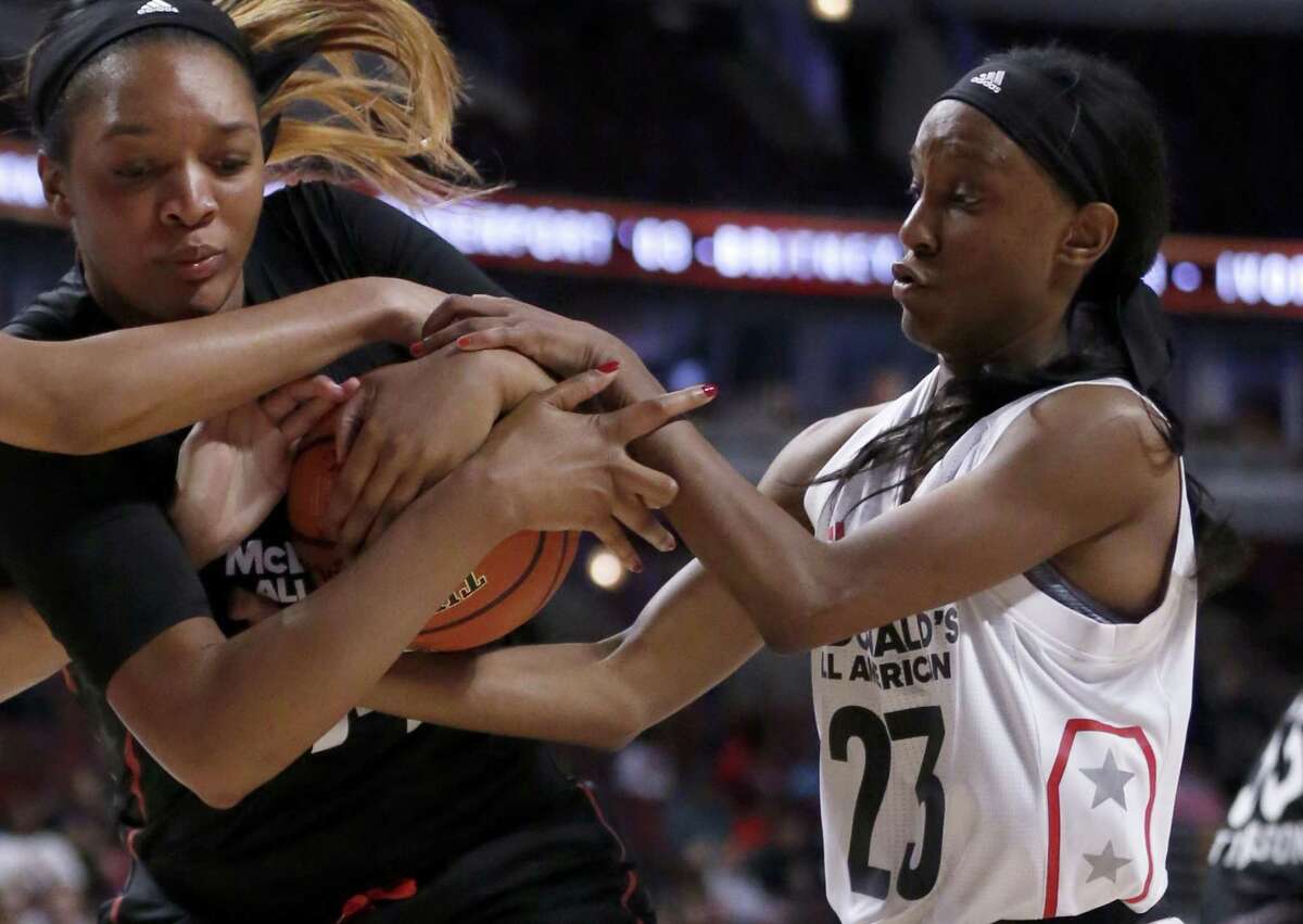Big West’s Kiana Williams (23), a former Wagner star, battles the Big East’s Kasiyahna “Kasi” Kushkituah for the ball during the first half of the McDonald’s All-American Basketball Game on March 29, 2017, in Chicago.