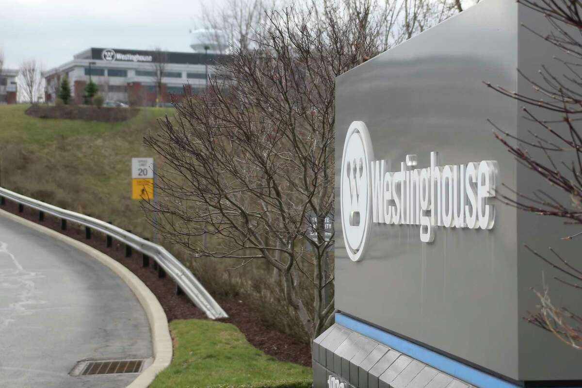 Signs mark the entrance to Westinghouse International Headquarters on Wednesday, March 29, 2017, in Cranberry, Pa., Butler county. Japan's embattled Toshiba Corp. says its U.S. nuclear unit Westinghouse Electric Co. has filed for bankruptcy protection, marking a key step in its struggles to stop the flow of massive red ink. (AP Photo/Keith Srakocic)