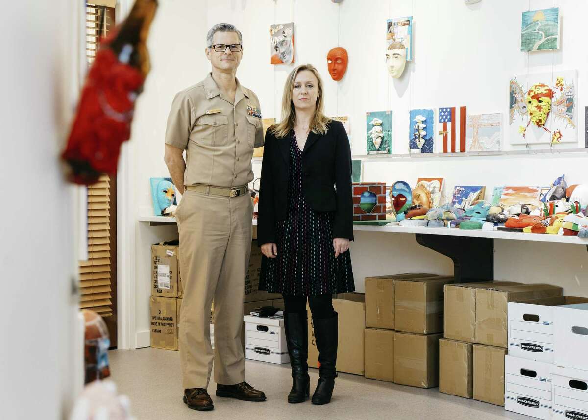 Walter M. Greenhalgh, director of the National Intrepid Center of Excellence, and Melissa Walker, a therapist for the Creative Forces program run by the National Endowment for the Arts, at Walter Reed Military Hospital in Bethesda, Md., March 23, 2017. An art therapy program for military service members helps them cope with haunting memories, disabilities and the future. (Justin T. Gellerson/The New York Times)