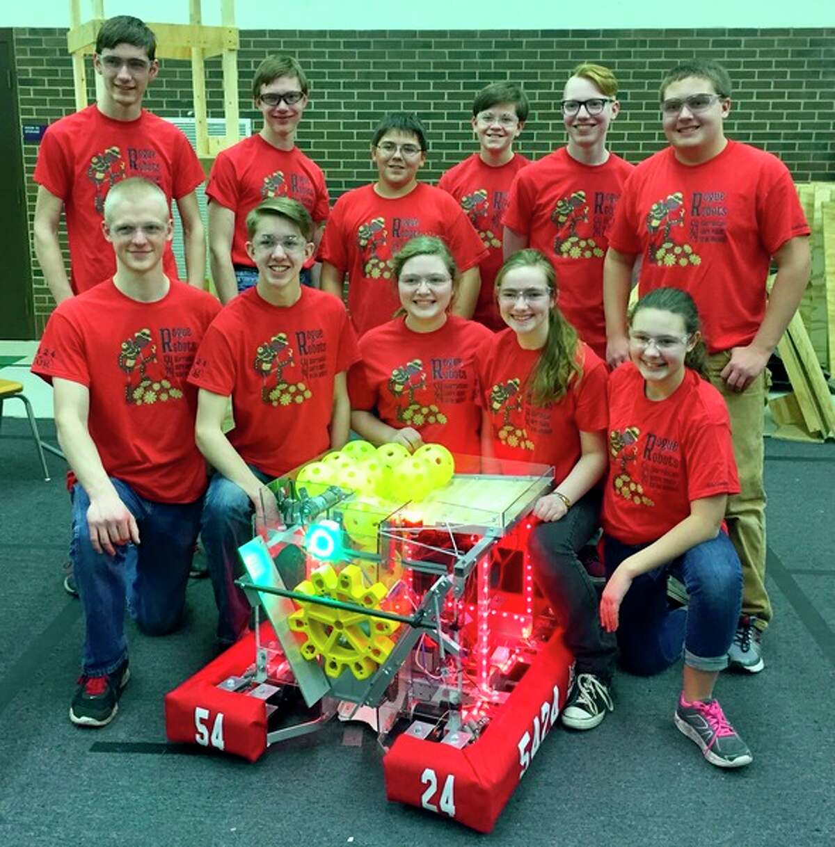 Team members of the Rogue Robots team are: Back row, from left: Isaac Fortier, Aaron Lehman, Drew Kennedy, Trent Huffman, Hayden Aspiranti and Karsten Molitor. Front row, from left: Andrew Moots, Micah Klingbeil, Ellie Molitor, Deborah Lehman and Amelia Molitor.