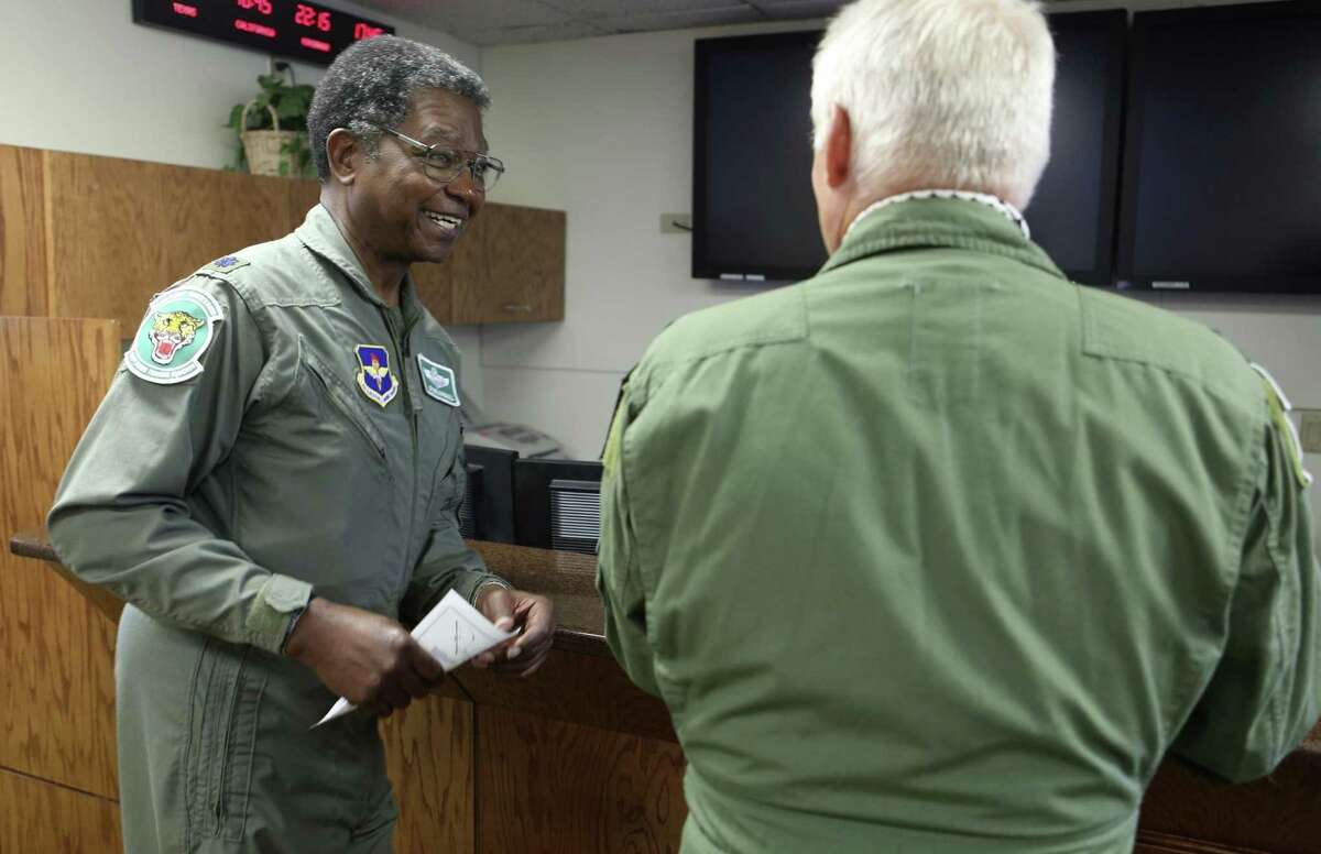 Tony Marshall (left) and Jack Trimble prepare for their “fini flight” honors. or champagne flight Thursday March 30, 2017 with the 560th Flight Training Squadron "Chargin' Cheetahs" of the 12th Flying Training Wing. Both men were shot while fighting in Vietnam and were never able to have their champagne flight. This was the first "fini" flight to honor air crew shot down over North Vietnam who were not pilots.